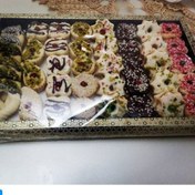 تصویر شیرینی مشهدی مربایی آلمانی با تزیین شکلات و پودر پسته و کنجد و پودر نارگیل و تازه و به روز 