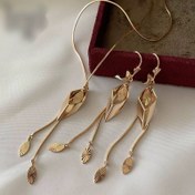 تصویر نیم ست زنانه ژوپینگ طرح طلا با زنجیر 