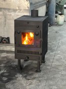 تصویر بخاری هیزمی کف چدن 