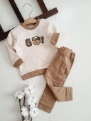 تصویر ست بلوز و شلوار نوزادی پسرانه طرح GO | دورس پنبه‌ای ارگانیک ضدحساسیت برند دانالو 