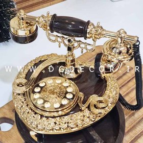 تصویر تلفن کوکی موزیکال در دو رنگ 