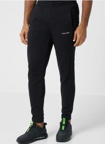 تصویر شلوار جین کمرکش با لوگوی گرافیکی برند Calvin Klein Garphic Logo Cuffed Sweatpants