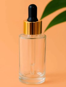 تصویر قطره چکان شیشه ای - ۳۰ میل شفاف / میل قطره مشکی طلایی 