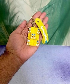 تصویر جاکلیدی سیلیکونی مدل خوشه انگور طرح باب اسفنجی 