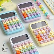 تصویر ماشین حساب پاستلی دکمه رنگی سایز کوچک 