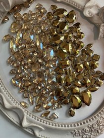 تصویر نگین طلایی شفاف 