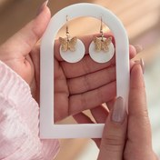 تصویر گوشواره صدف و پروانه 