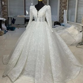 تصویر لباس عروس دو کلوش با پارچه تمام کار شده دانتل فرانسه Bride dress