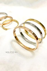 تصویر دستبند زنانه برند کارتیِرمدل ساده استیل رنگ ثابت وارزان Women's bracelet of Cartier brand, simple model, fixed color steel