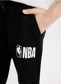 تصویر شلوار جگر با کمر کشی و جیب‌دار تیم‌های فعلی NBA برند Defacto Nba Current Teams Elasticated Cuff Jogger Pants With Pockets