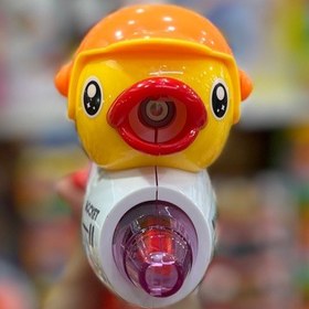 تصویر تفنگ موزیکال و دودزا جوجه 