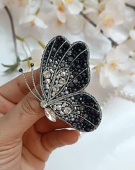 تصویر گل سینه جواهر دوزی پروانه 