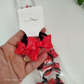 تصویر کش پاپیونی قرمز 