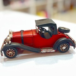 تصویر ماشین دکوری مدل کلاسیک با لاستیک زاپاس 