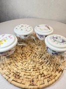 تصویر لیوان دمنوش در سرامیک طرح شکوفه 