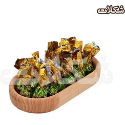 تصویر شکلات رومینی مغزدار پسته یکسرپیچ فله شیرین عسل 