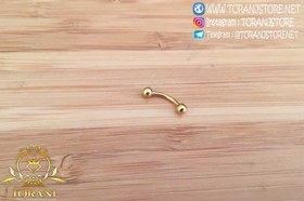 تصویر پیرسینگ طلایی ابرو و دست و انگشت ضد حساسیت 