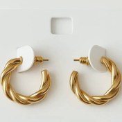 تصویر گوشواره حلقه‌ای پیچ خورده طلایی 