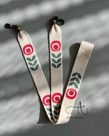 تصویر بند عینک گل دایره سه برگ 