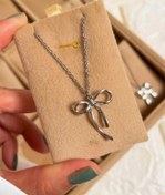 تصویر گردنبند پاپیون دخترانه با زنجیر استیل 