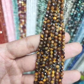 تصویر ریسه سنگ چشم ببر سایز ۴ تراش کد13300 Tiger's Eye Stone Strand, Size 4 Cut, Code 13300