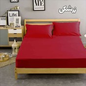 تصویر روتختی دونفره ساده رنگ قرمز 3 تکه . ملحفه کشدار و روتختی کشدار تشک دونفره 