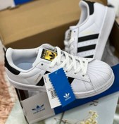 تصویر کفش ورزشی آدیداس مدل FU7712 رنگ سفید-سیاه با چرم مصنوعی 