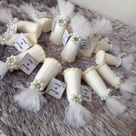 تصویر کله قند بندانگشتی 