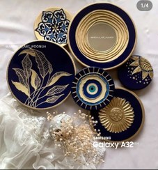 تصویر ست دیوار کوب سرمه ای طلایی برجسته با ورق طلا و آینه 