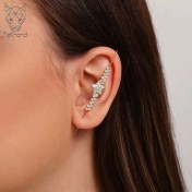 تصویر گوشواره عصایی استار دایموند dimondal star air cross gold earring