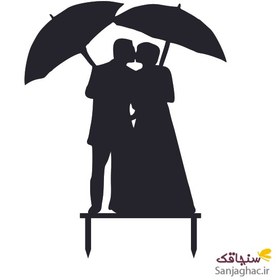 تصویر تاپر کیک عروس و داماد چتر در دست 