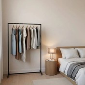 تصویر رگال لباس مدرن مشکی با طراحی مینیمال 