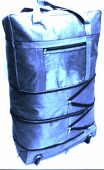 تصویر ست دو عددی ساک چرخ دار سه طبقه و ساک احرامی کوچک 