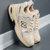 تصویر کتانی نیو بالانس مدل 530 رنگ کرم مشکی 