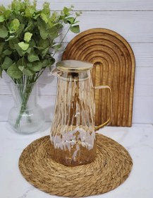 تصویر پارچ آب پیرکس وارداتی _پارچ شربت پیرکس طرح موج دسته طلایی Imported Pyrex water pitcher _Pyrex syrup pitcher, wave design