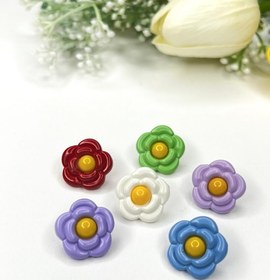 تصویر دکمه بچگانه گل پلاستیکی 