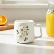 تصویر ماگ سرامیکی طرح بابونه برجسته کد231 Ceramic mug with embossed chamomile design, code 231