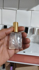 تصویر شیشه عطر 15میل مکعبی(1جین 12عددی) 