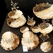 تصویر سرویس پذیرایی شیک ۱۲ نفره رزینی رنگ نباتی طلایی با تکه های ورق طلا 