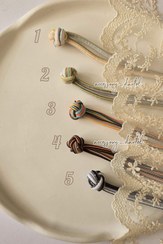 تصویر کش موی گره ای طرحدار راه راه - ۲ 