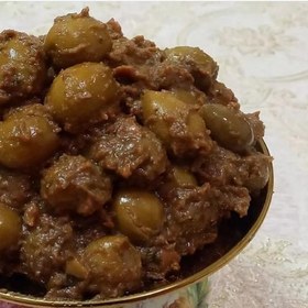 تصویر زیتون پرورده اعلا و درجه یک فرآوری شده با مغز گردو 