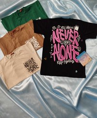 تصویر تیشرت بچه گانه طرح فانتزی کارتونی never alone t-shirt never alone