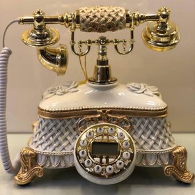 تصویر تلفن رومیزی کد ۱۰۰ 