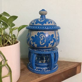 تصویر وارمر سنگی طرح گل سنگ 