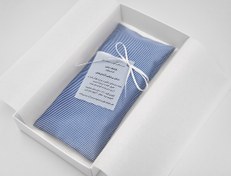 تصویر بالشتک چشم راه‌راه آبی 