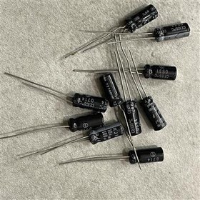 تصویر خازن ELNA rjf 100uf 10v بسته 100 عددی 