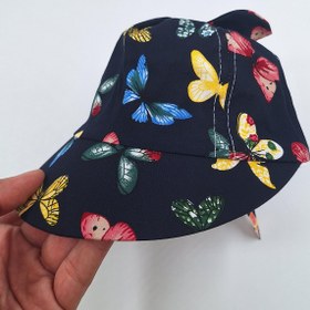 تصویر کلاه نوزادی طرح پروانه کد 1288 رنگ مشکی 