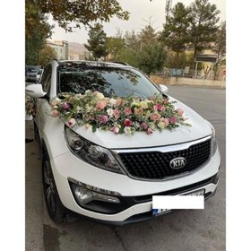 تصویر ماشین عروس اپتیما تزیین با گل های طبیعی 4954 