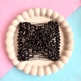 تصویر شانه جادویی شکوفه ای 