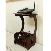 تصویر میز تلفن و روزنامه قهوه ای طرح موج دار 